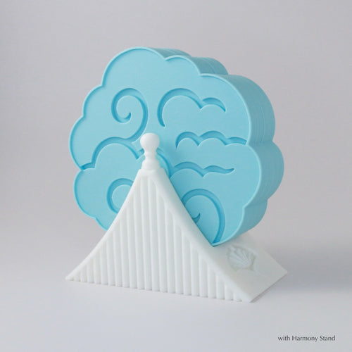 Blue cloud-shaped object with a white cone-like structure on a light gray background